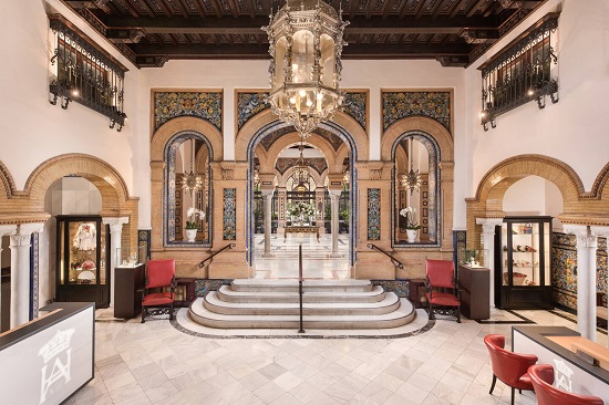 Commissioned by the King of Spain to play host to international dignitaries during the 1929 Exhibition, Hotel Alfonso XIII, a Luxury Collection Hotel remains an iconic cultural landmark, centrally located in the historic quarter of Santa Cruz, next to Reales Alcázares and Seville Cathedral. The hotel’s distinguished architecture and Moorish detailing have been enriched, showcasing native Andalusian design and heritage to a new generation of traveler. The hotel's elegant décor, from the lobby to the inner courtyard, continues to reflect Sevillian style. This ambience also pervades our outdoor swimming pool and gardens, which entice guests to relax and refresh under the warm Andalusian sun.