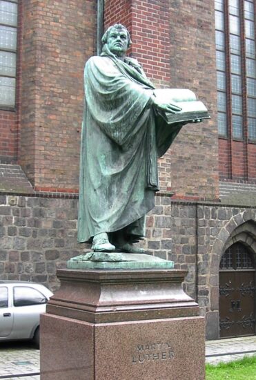 https://en.wikipedia.org/wiki/St._Mary%27s_Church,_Berlin#/media/File:Statue_of_Martin_Luther,_St._Mary's_Church,_Mitte,_Berlin.jpg