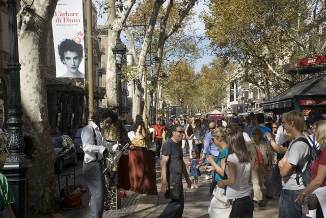 https://commons.wikimedia.org/wiki/Category:La_Rambla#/media/File:Barcelona_-_Rambla_dels_Caputxins_-_View_NNW_-_'Pilar'_National_Holiday_in_Spain.jpg